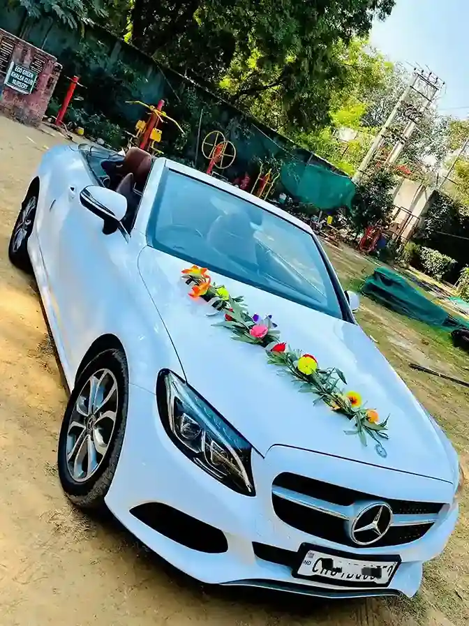 Decorated white luxury convertible wedding car in Dehradun
