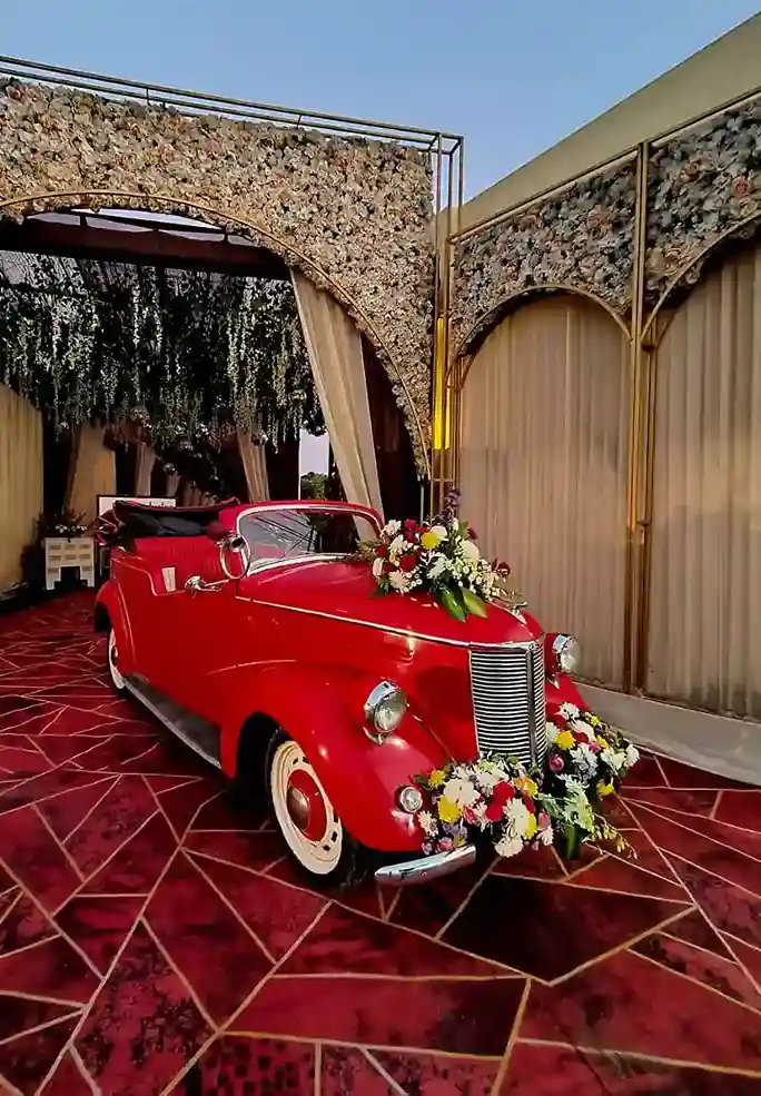 Red Vintage 1930s decorated wedding car